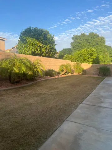 a view of balcony with furniture