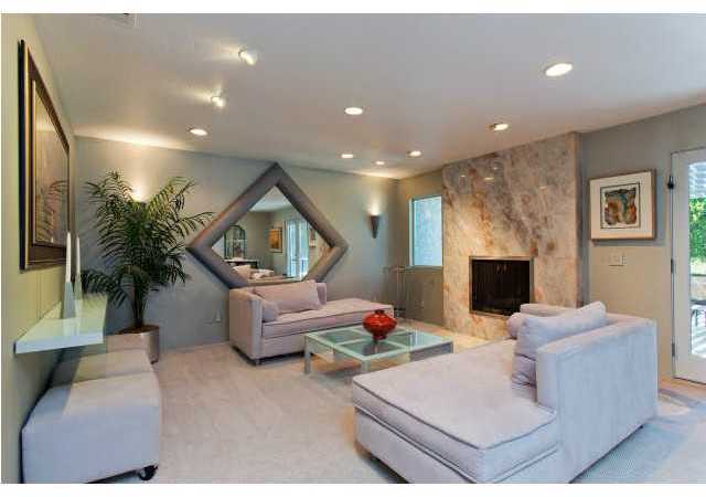 1717 Avocado Road Oceanside, CA 92054 - Photo 6 of 25 Warm yourself by the dramatic fireplace