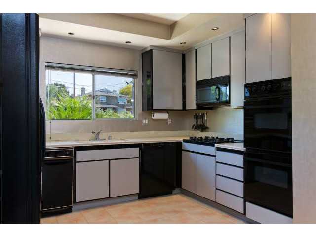 1717 Avocado Road Oceanside, CA 92054 - Photo 10 of 25 Kitchen has direct access from driveway