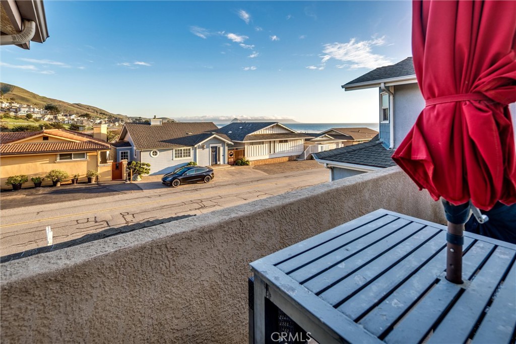 33 23rd Street Cayucos, CA 93430 - Photo 11 of 31 a view of a terrace with a bench