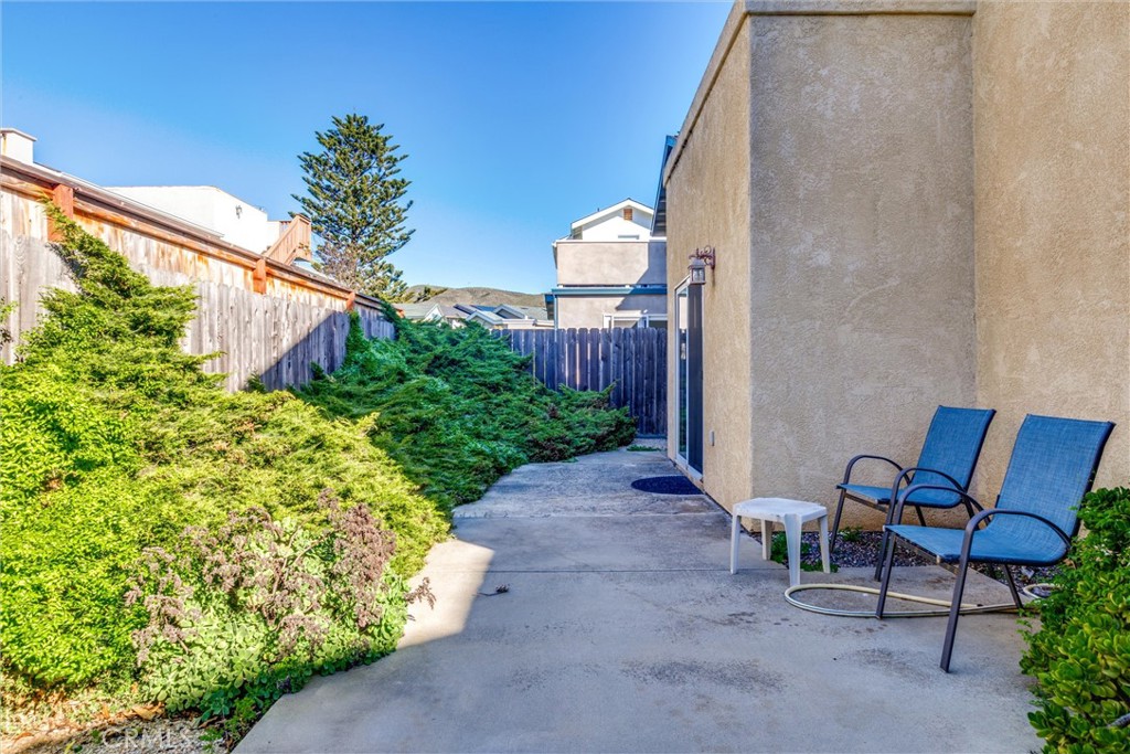 33 23rd Street Cayucos, CA 93430 - Photo 25 of 31 a view of backyard with outdoor seating and plants