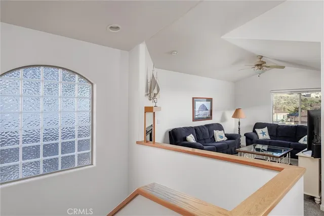 a view of living room with furniture and window