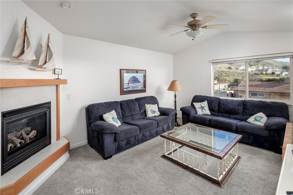 33 23rd Street Cayucos, CA 93430 - Photo 8 of 31 a living room with furniture and a fireplace