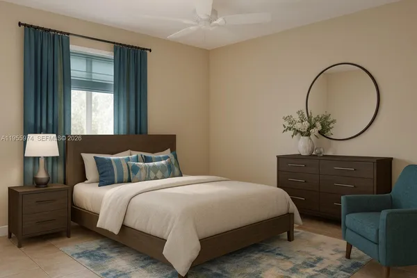 a bedroom with bed and a dresser