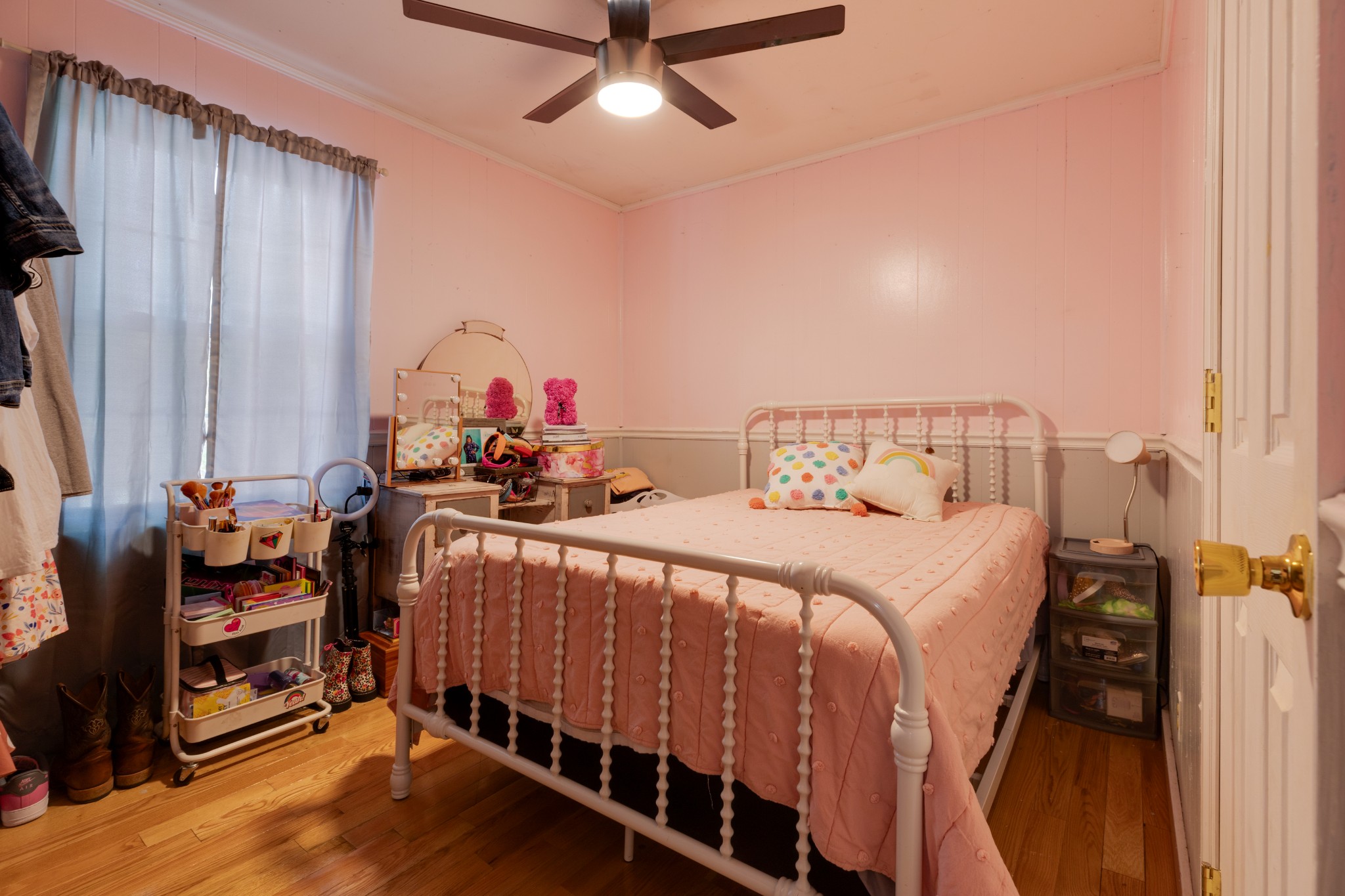 130 Mae Circle Dickson, TN 37055 - Photo 19 of 27 a bedroom with a bed and a chandelier