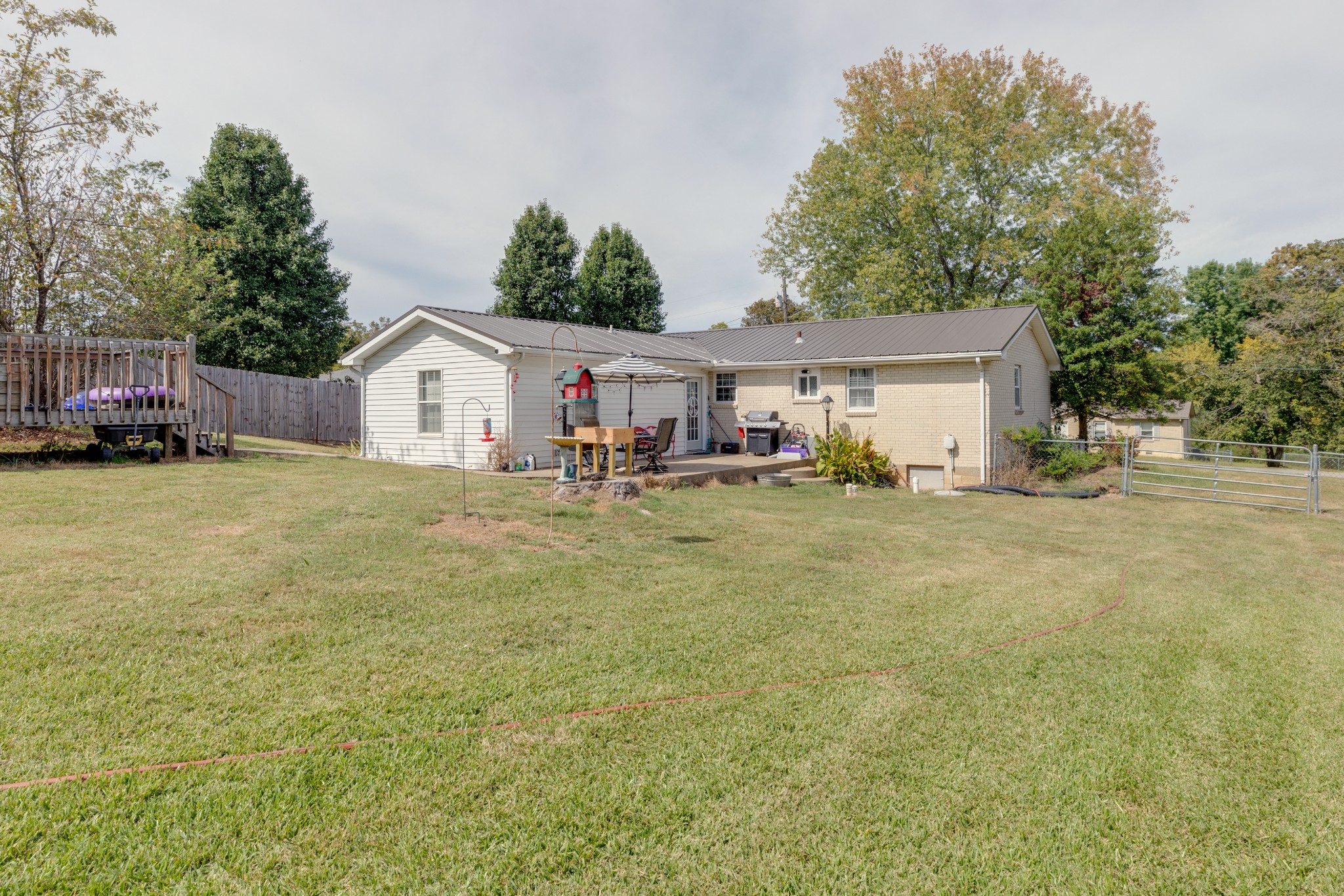 130 Mae Circle Dickson, TN 37055 - Photo 25 of 27 a view of a house with backyard and sitting area