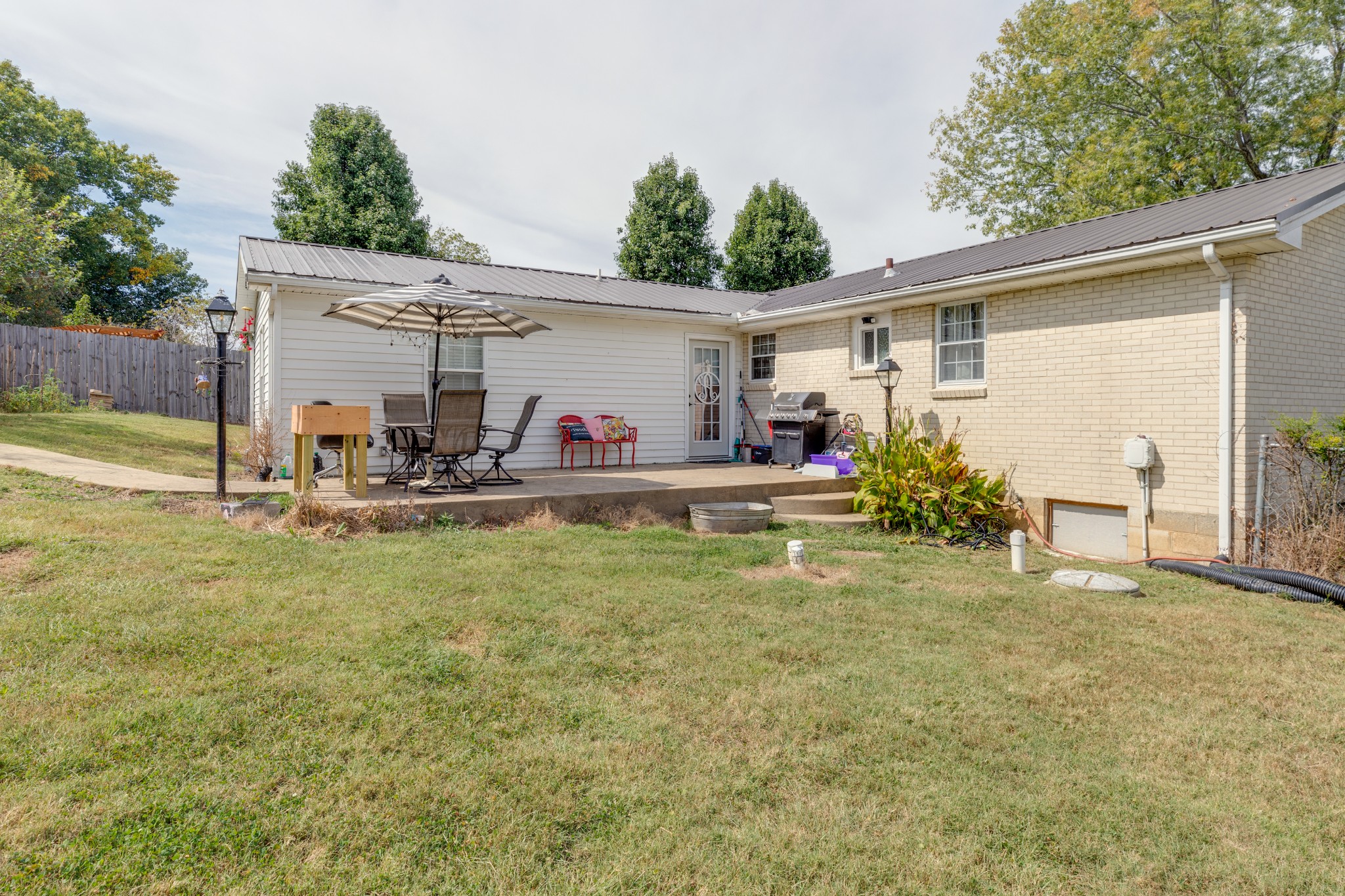 130 Mae Circle Dickson, TN 37055 - Photo 26 of 27 a view of a house with backyard and sitting area