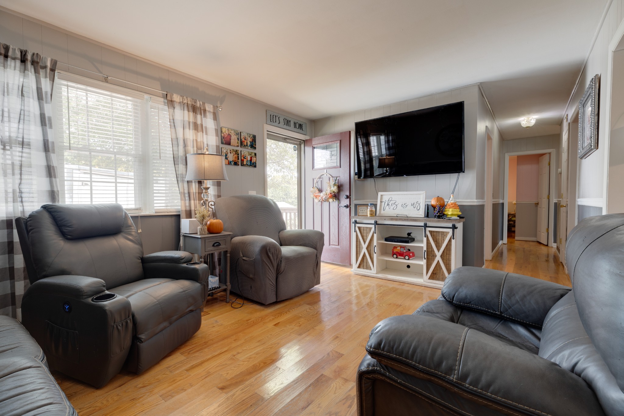 130 Mae Circle Dickson, TN 37055 - Photo 6 of 27 a living room with furniture and a flat screen tv