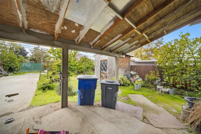 a view of a porch with garden