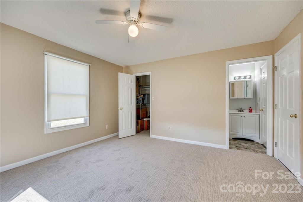 203 Brook Street Belmont, NC 28012 - Photo 12 of 17 a view of an empty room with a window