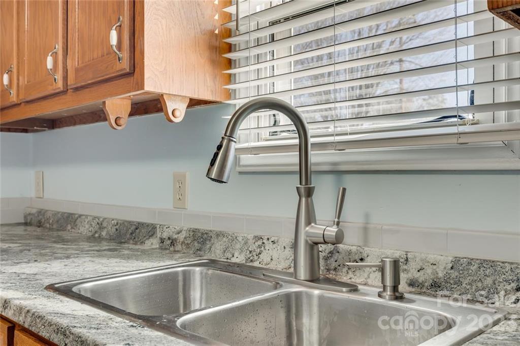 203 Brook Street Belmont, NC 28012 - Photo 13 of 17 a close view of sink and tap