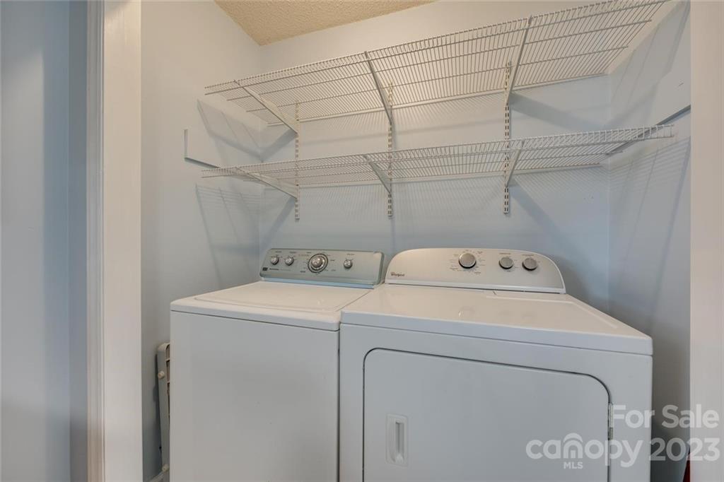 203 Brook Street Belmont, NC 28012 - Photo 15 of 17 a utility room with dryer and washer