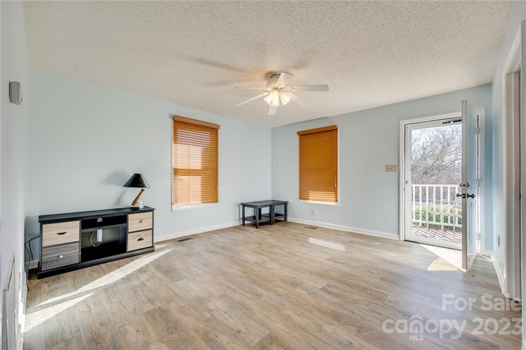 203 Brook Street Belmont, NC 28012 - Photo 6 of 17 a view of a livingroom with a workspace