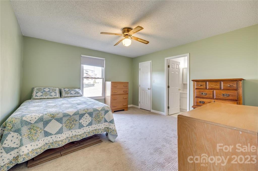 203 Brook Street Belmont, NC 28012 - Photo 10 of 17 a bedroom with a bed and window