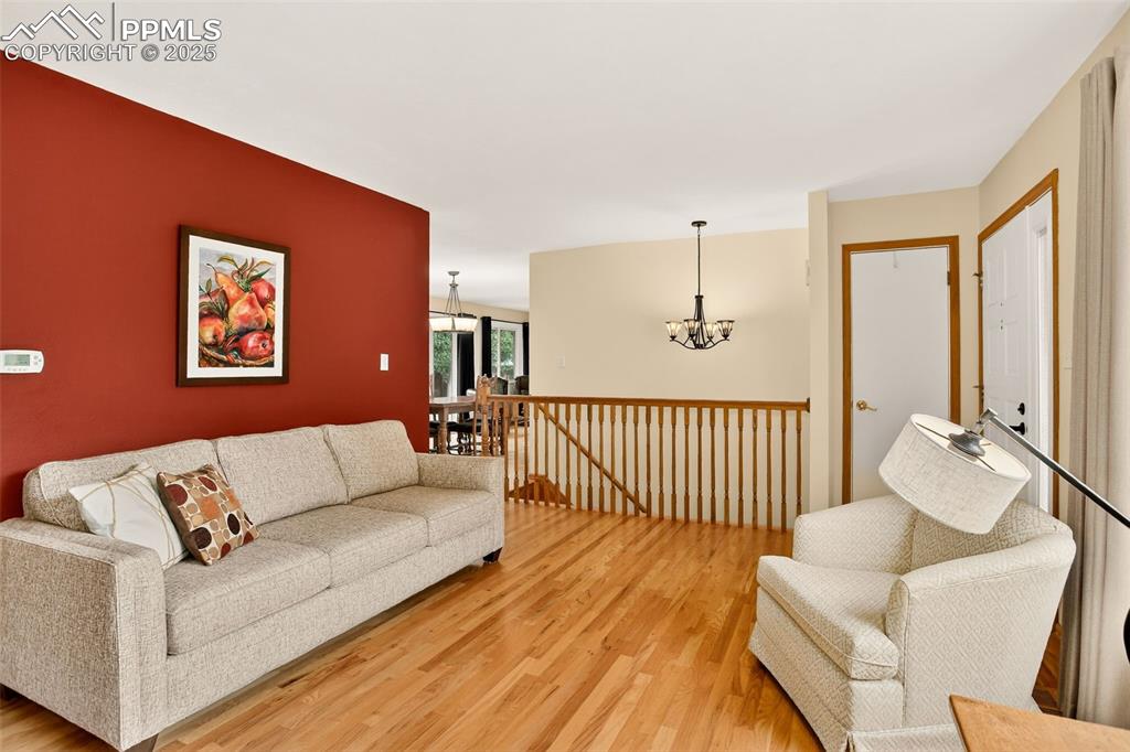 6035 Tuckerman Lane Colorado Springs, CO 80918 - Photo 11 of 47 a living room with furniture and a window