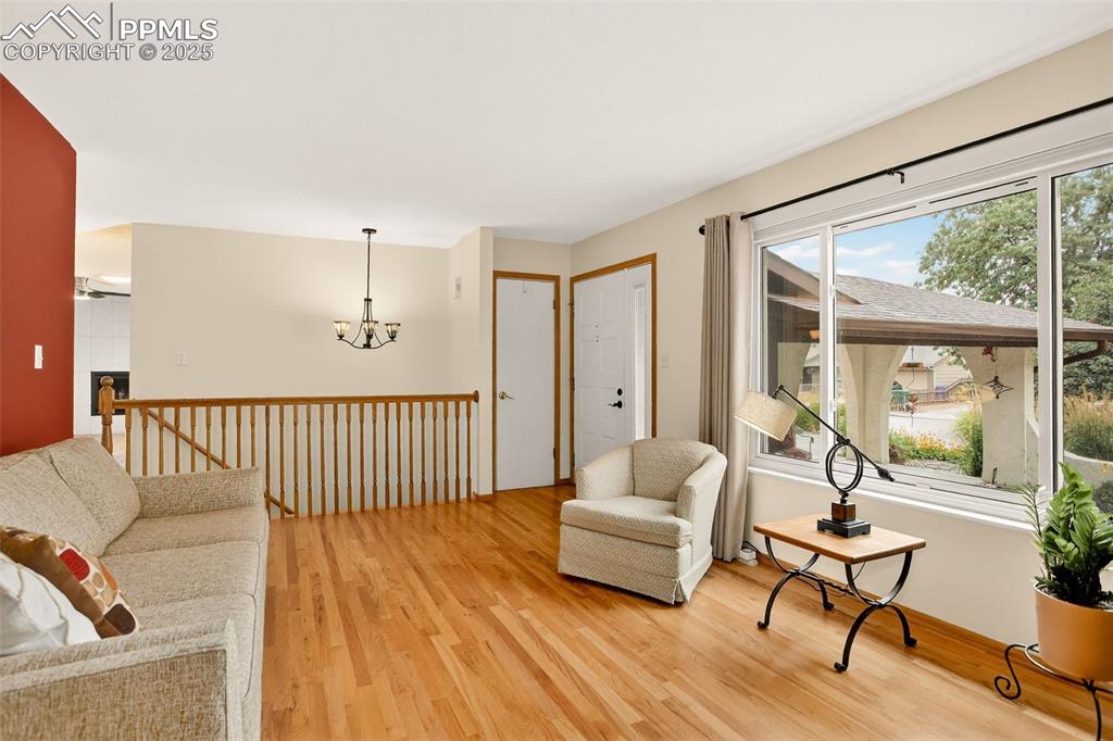 6035 Tuckerman Lane Colorado Springs, CO 80918 - Photo 12 of 47 a living room with furniture and a table