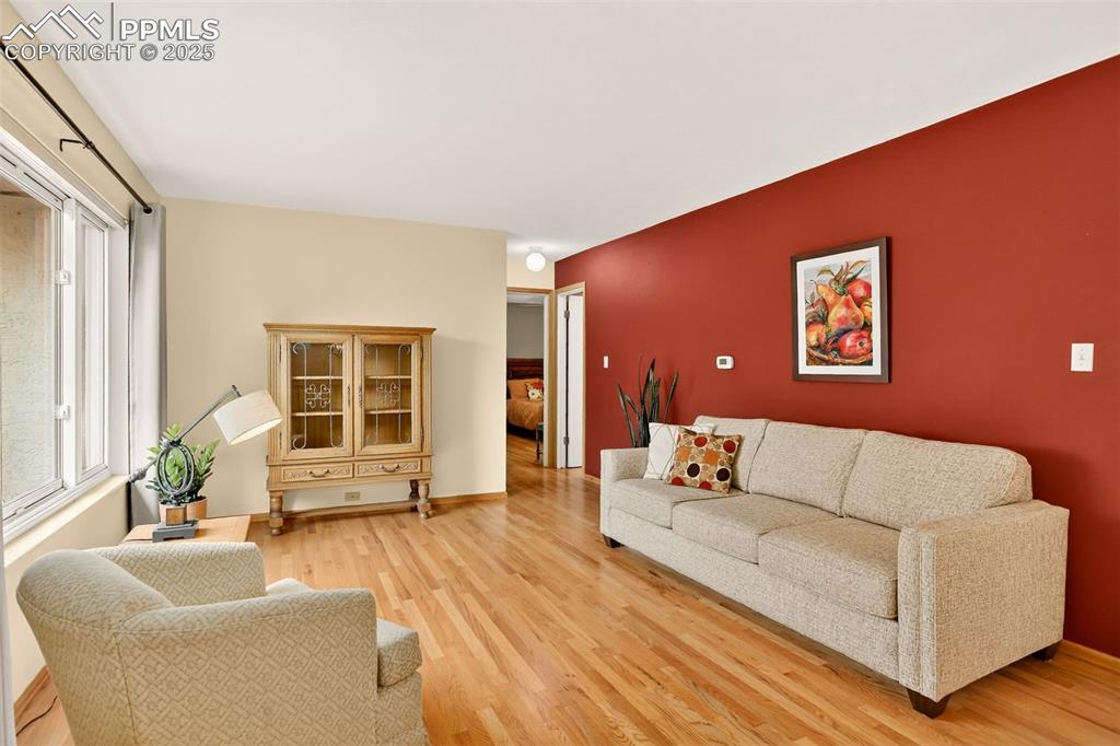 6035 Tuckerman Lane Colorado Springs, CO 80918 - Photo 13 of 47 a living room with furniture and window