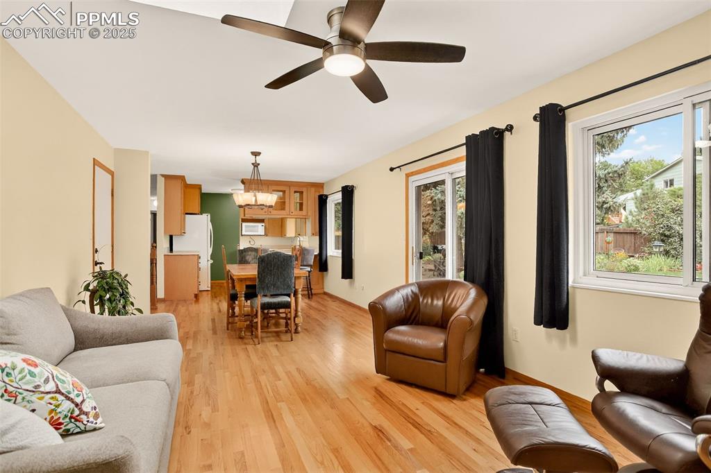 6035 Tuckerman Lane Colorado Springs, CO 80918 - Photo 20 of 47 a living room with furniture and a large window