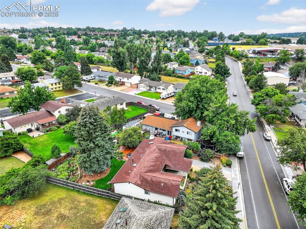 6035 Tuckerman Lane Colorado Springs, CO 80918 - Photo 43 of 47 an aerial view of residential houses with outdoor space and swimming pool