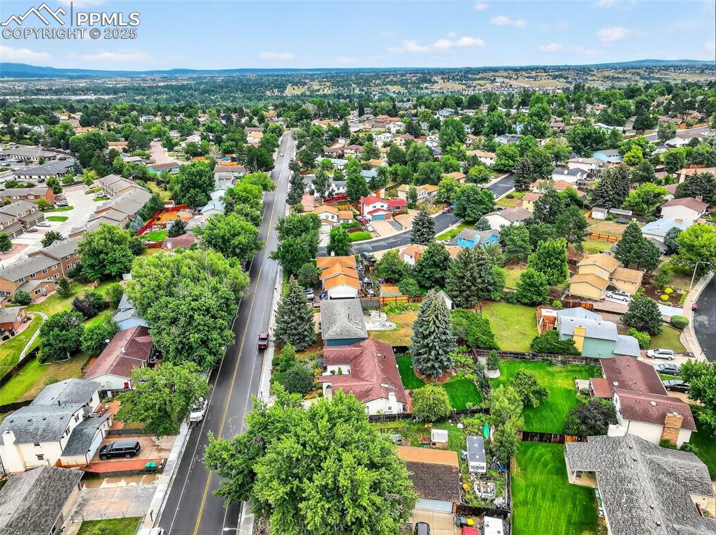 6035 Tuckerman Lane Colorado Springs, CO 80918 - Photo 46 of 47 an aerial view of residential houses with outdoor space and trees