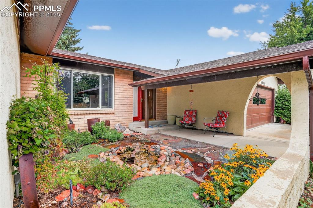 6035 Tuckerman Lane Colorado Springs, CO 80918 - Photo 7 of 47 a view of a porch