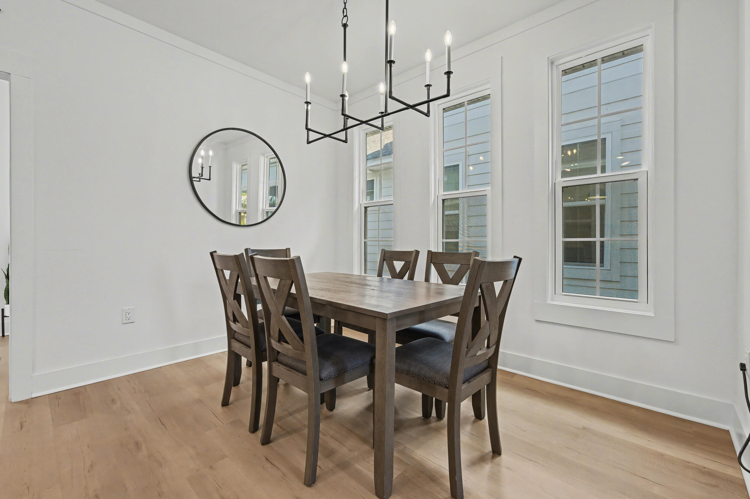 141 South H Street Pensacola, FL 32502 - Photo 11 of 30 a view of a dining room with furniture window and wooden floor