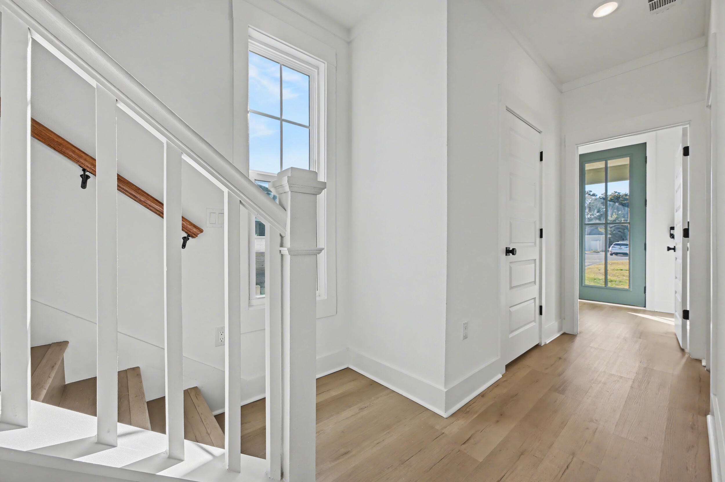 141 South H Street Pensacola, FL 32502 - Photo 16 of 30 a view of an entryway with wooden floor