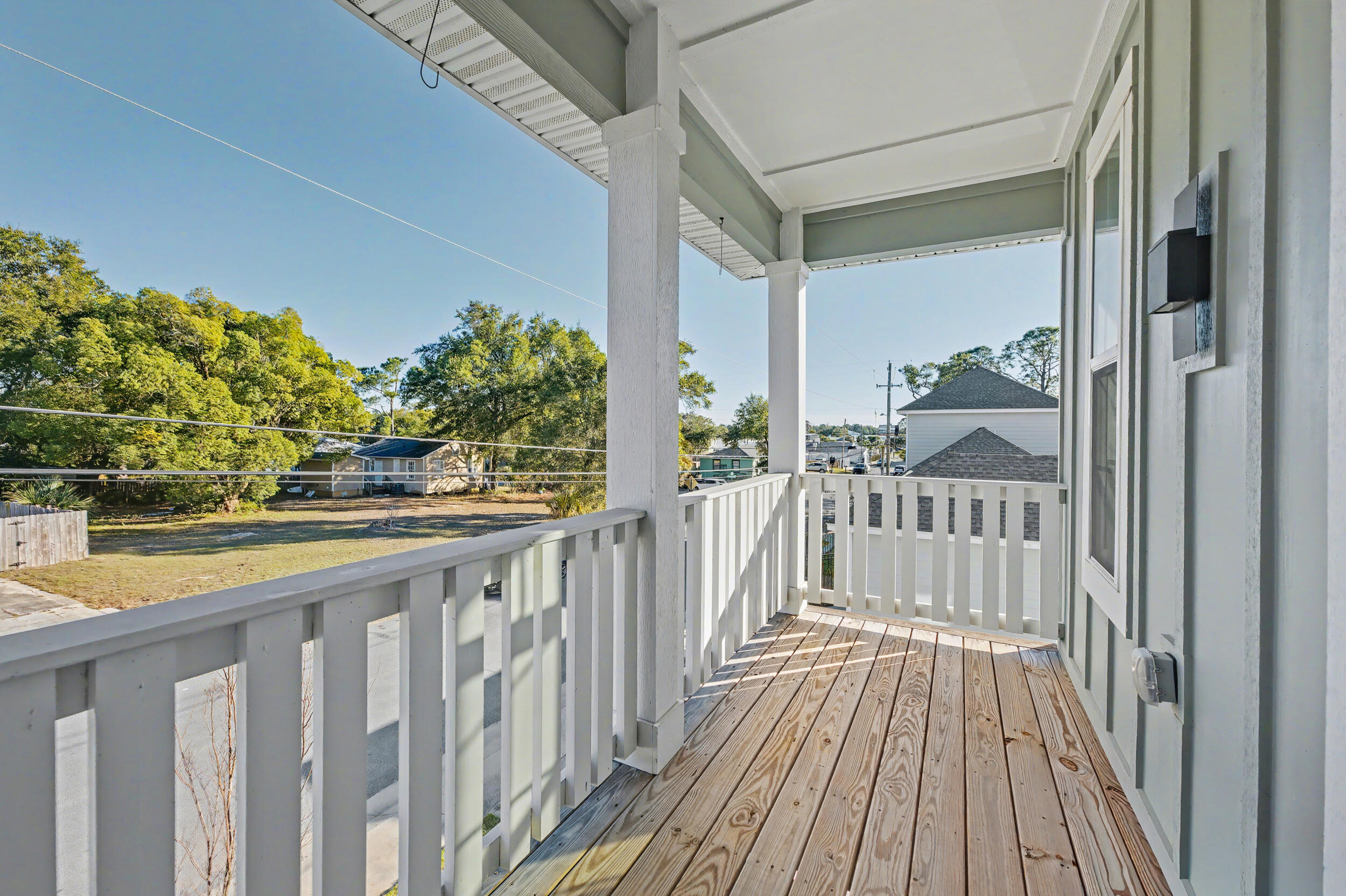 141 South H Street Pensacola, FL 32502 - Photo 24 of 30 a view of a balcony with wooden floor
