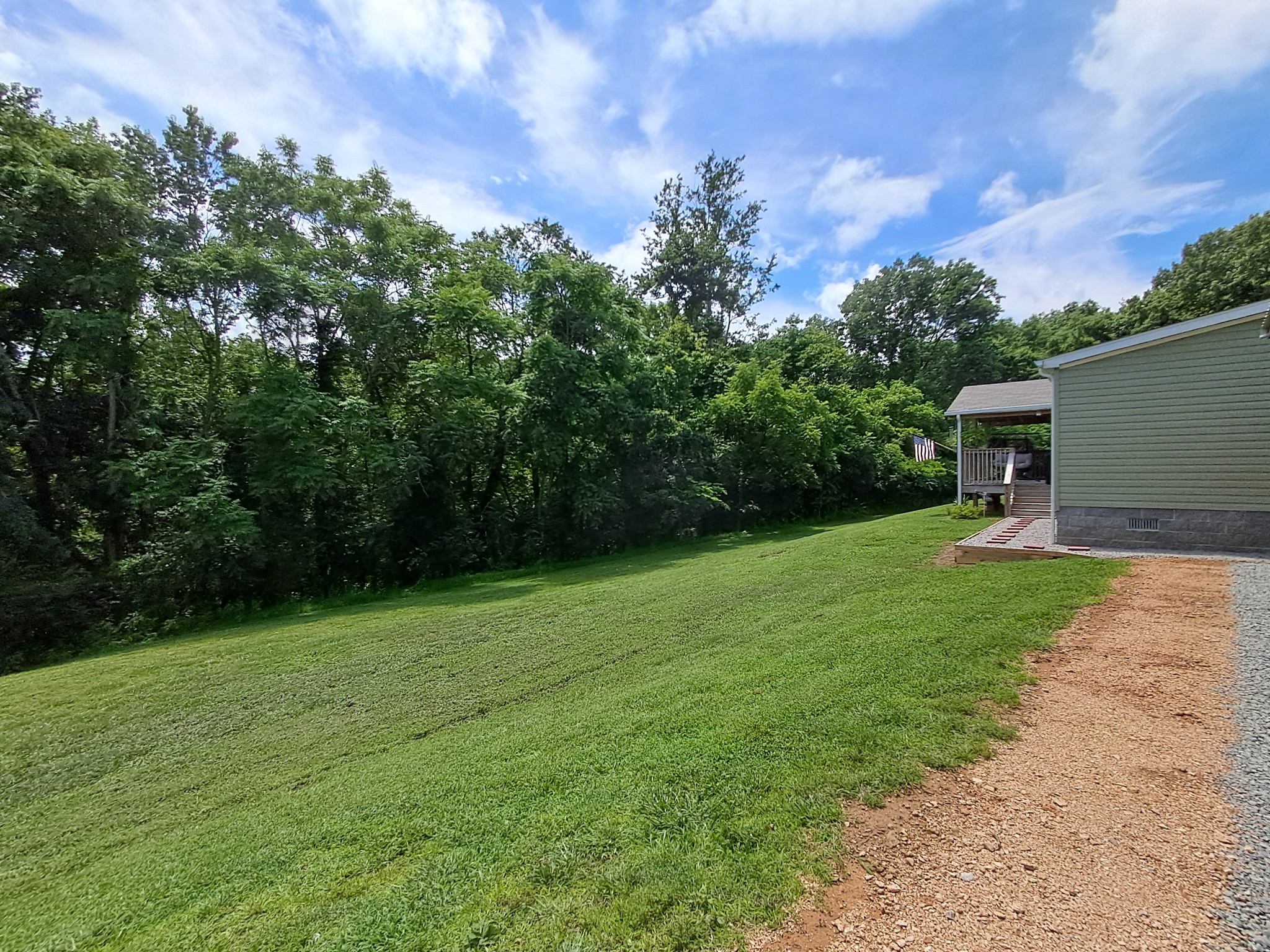 5525 Wiley Hollow Road Culleoka, TN 38451 - Photo 23 of 64 a view of a backyard with a garden