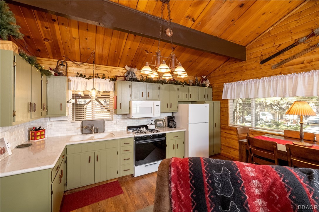 350 Riverside Avenue Sugarloaf, CA 92386 - Photo 5 of 25 a kitchen with a sink appliances and cabinets