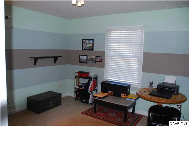 4744 Amicus Road Ruckersville, VA 22968 - Photo 8 of 19 a living room with furniture and a window