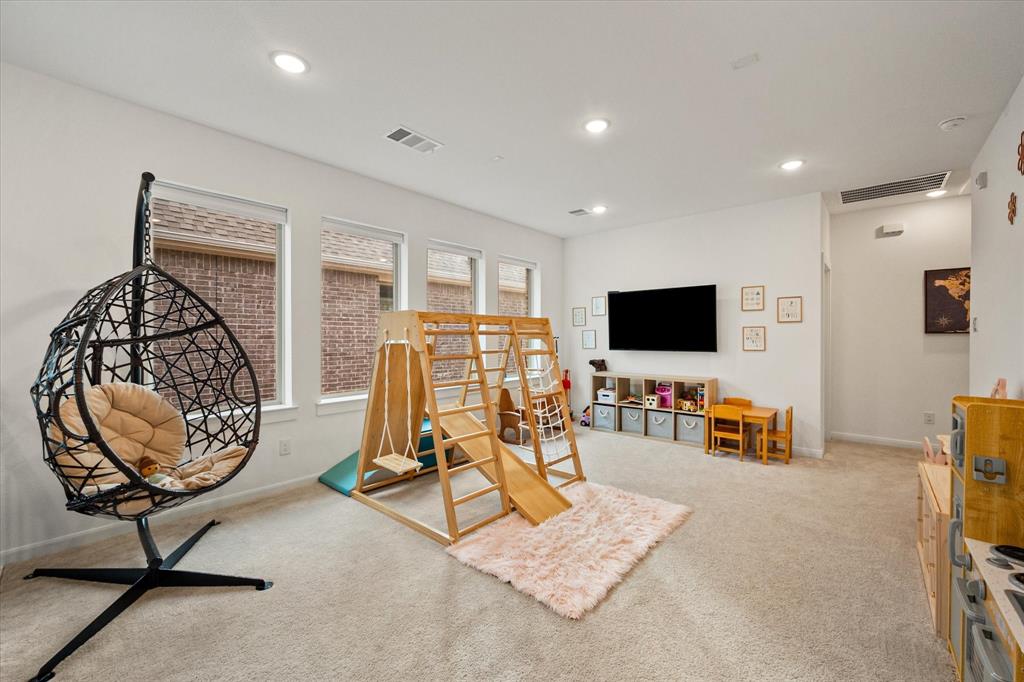 208 Scottish Way Mansfield, TX 76063 - Photo 23 of 38 Recreation room featuring light colored carpet and recessed lighting