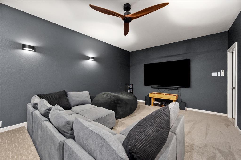 208 Scottish Way Mansfield, TX 76063 - Photo 30 of 38 Private Cinema room with ceiling fan.