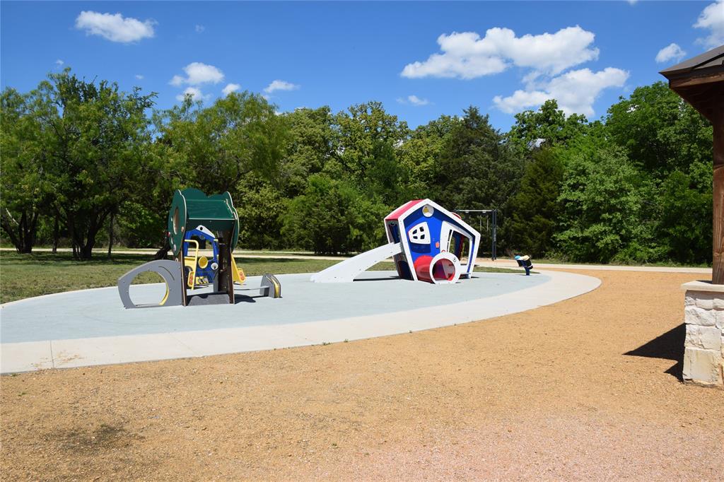 208 Scottish Way Mansfield, TX 76063 - Photo 36 of 38 Community jungle gym with view of scattered trees!