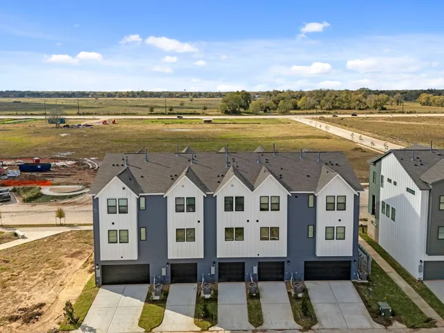 a view of a city with an ocean view