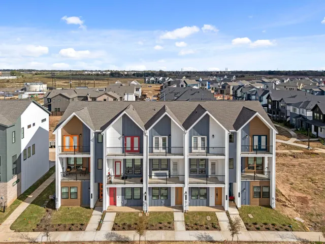a view of a city with tall buildings