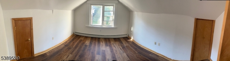 9 Orchard Street Passaic, NJ 07055 - Photo 17 of 19 a view of entryway with wooden floor