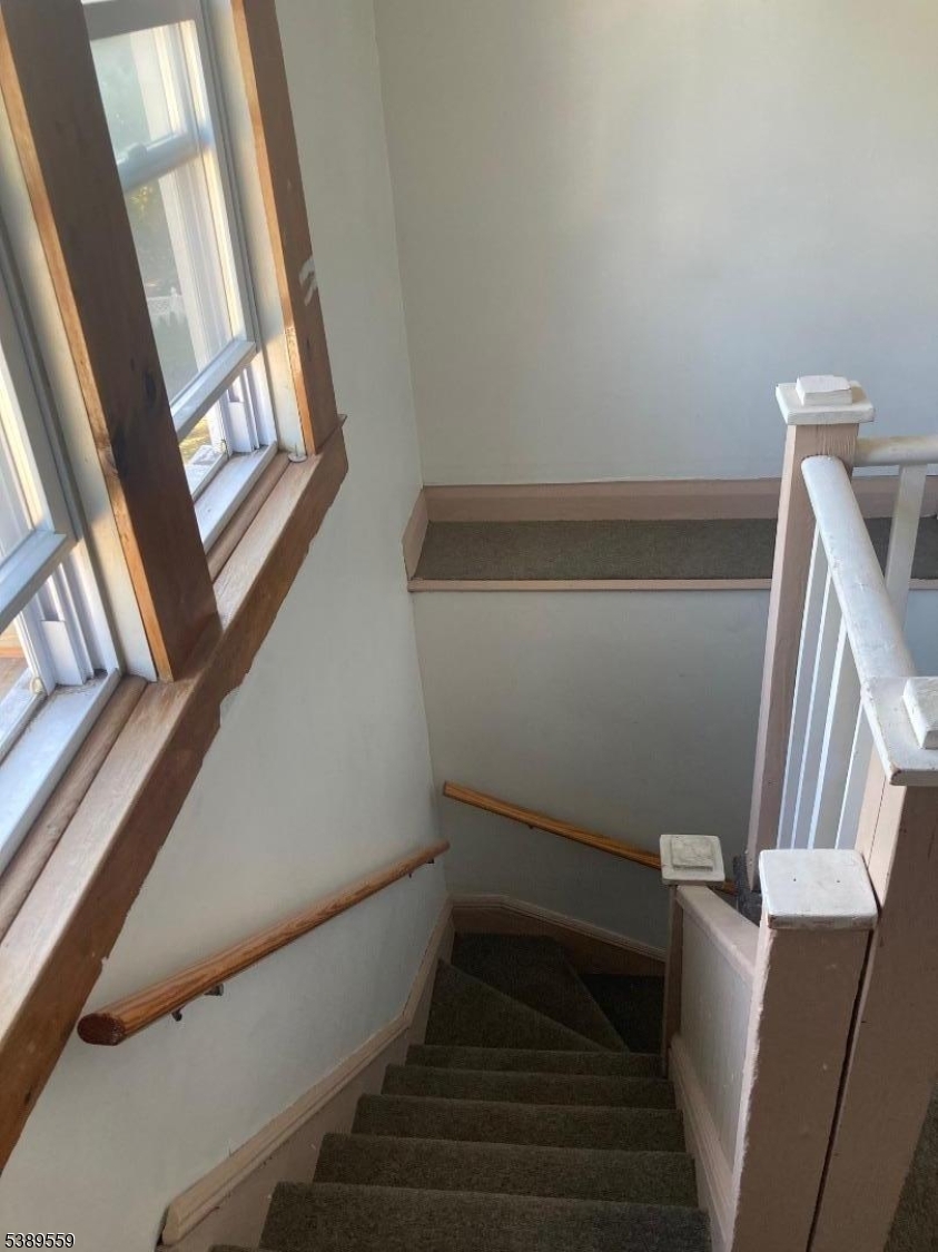 9 Orchard Street Passaic, NJ 07055 - Photo 4 of 19 a view of stairs