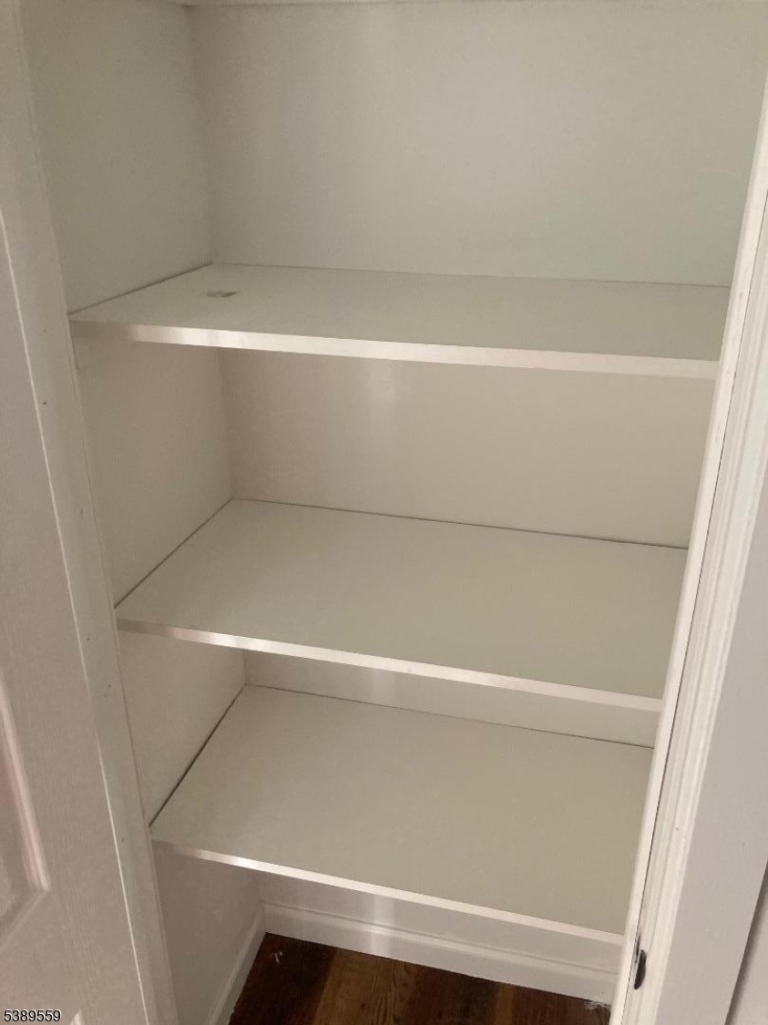 9 Orchard Street Passaic, NJ 07055 - Photo 9 of 19 a close up view of racks