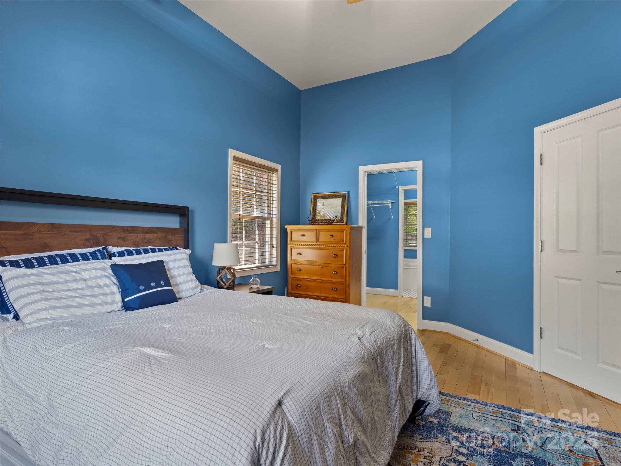 57 Regent Drive Fletcher, NC 28732 - Photo 20 of 33 a bedroom with a bed and window