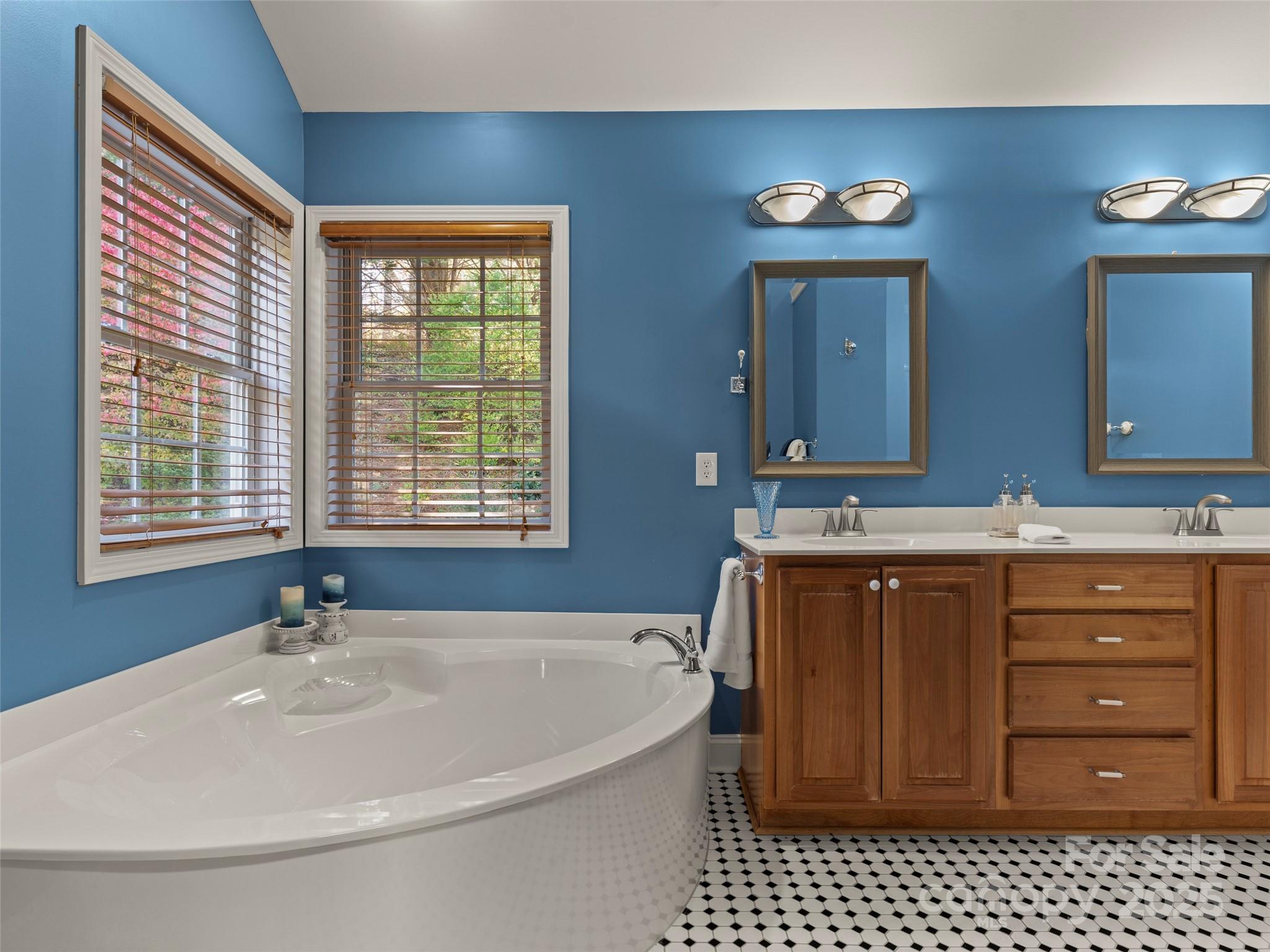 57 Regent Drive Fletcher, NC 28732 - Photo 22 of 33 a bathroom with a sink a vanity and a mirror