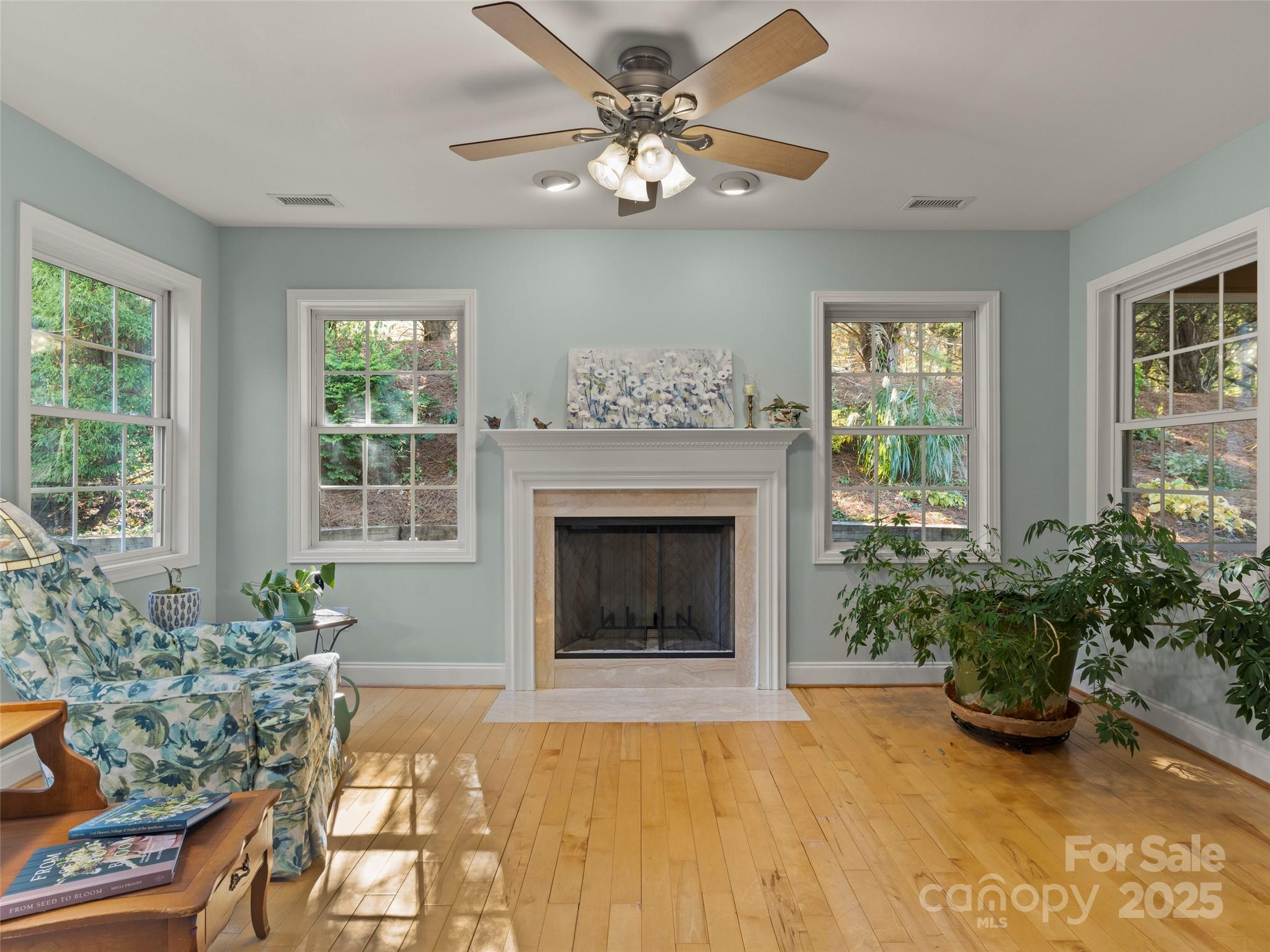 57 Regent Drive Fletcher, NC 28732 - Photo 5 of 33 a living room with furniture and a fireplace