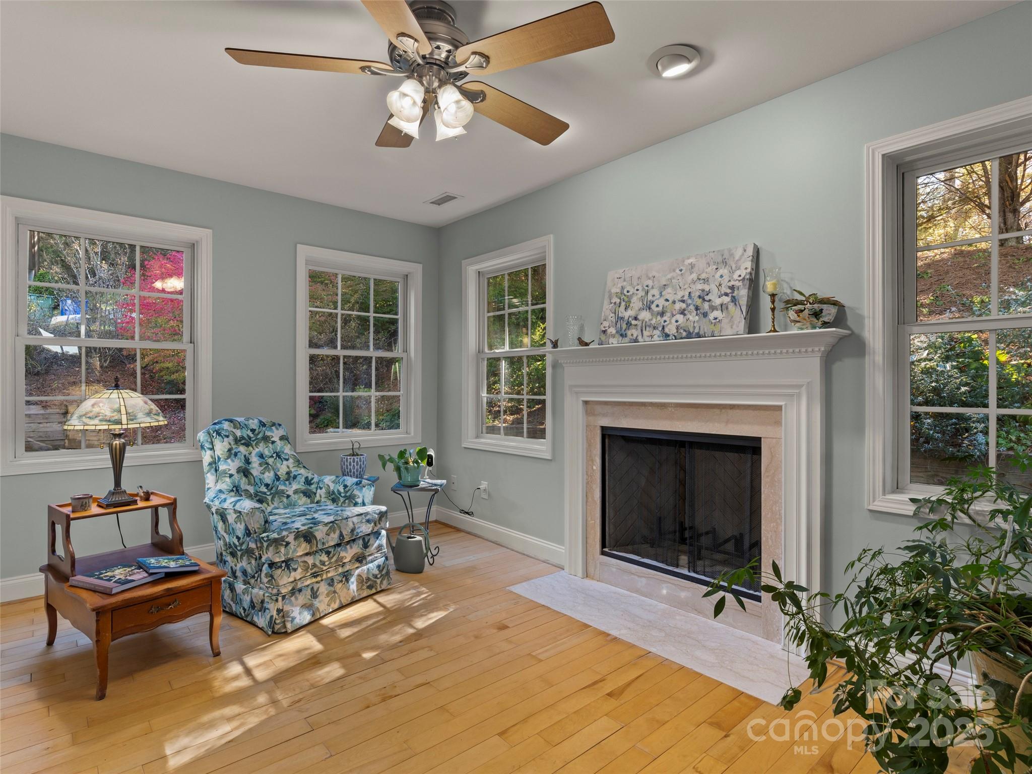 57 Regent Drive Fletcher, NC 28732 - Photo 6 of 33 a living room with furniture and a fireplace