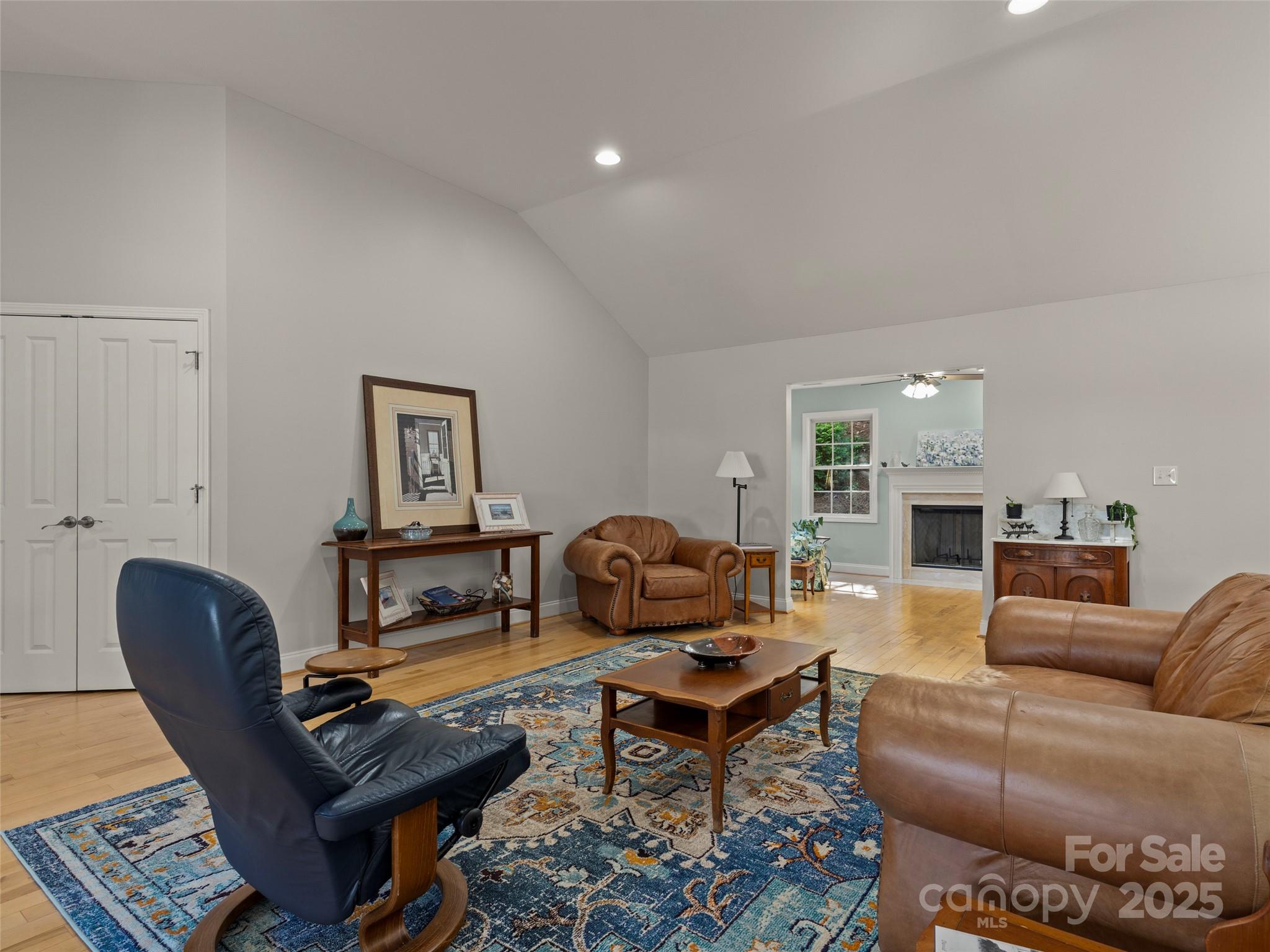 57 Regent Drive Fletcher, NC 28732 - Photo 10 of 33 a living room with furniture a fireplace and a window