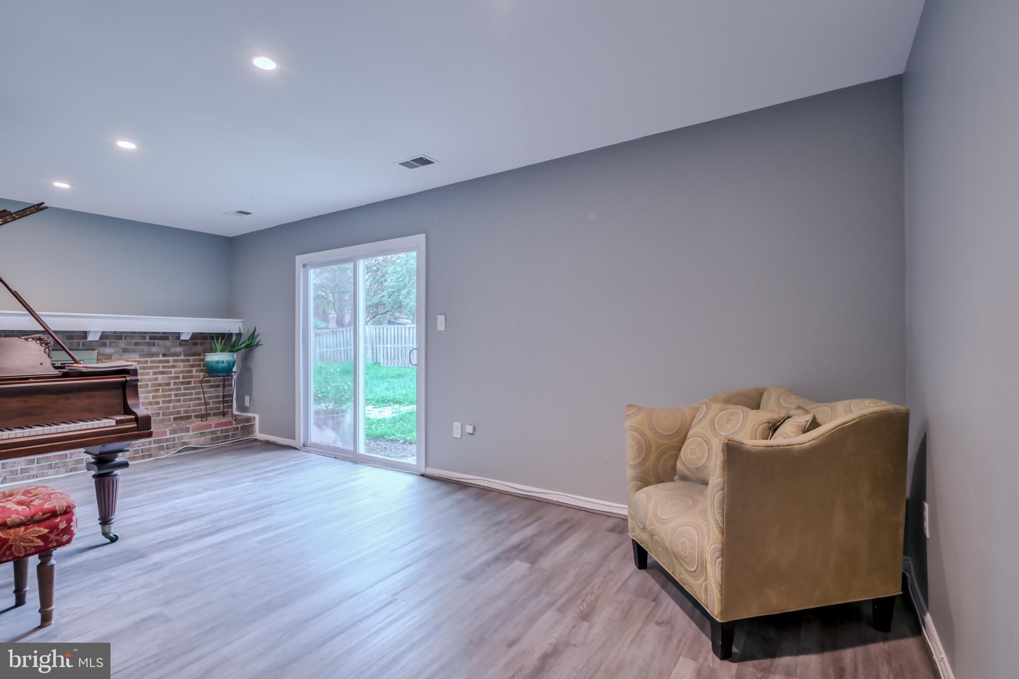 4525 Flintstone Road Alexandria, VA 22306 - Photo 31 of 39 Walk out rec room to fully fenced backyard