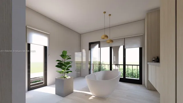 a view of an empty room with a potted plant