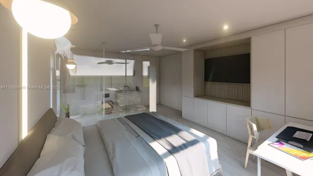 a view of a hallway with a flat screen tv