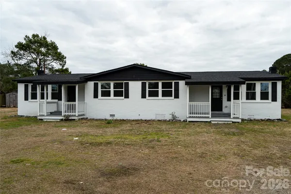 front view of a house with a big yard