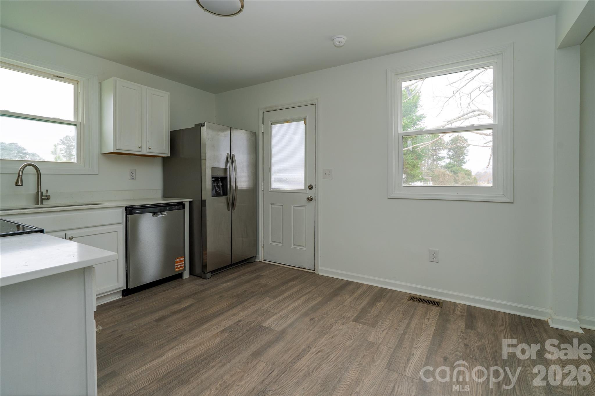 421 Pineville Road Darlington, SC 29532 - Photo 26 of 36 a kitchen with a refrigerator and a sink