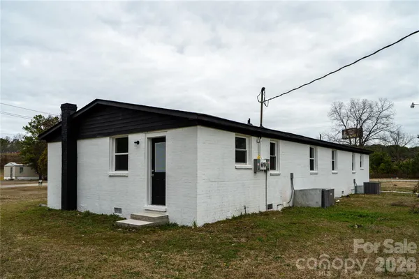 a house with yard in front of it